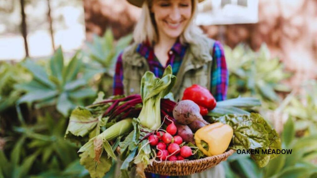 A happy gardener harvesting fresh produce from a container garden.
